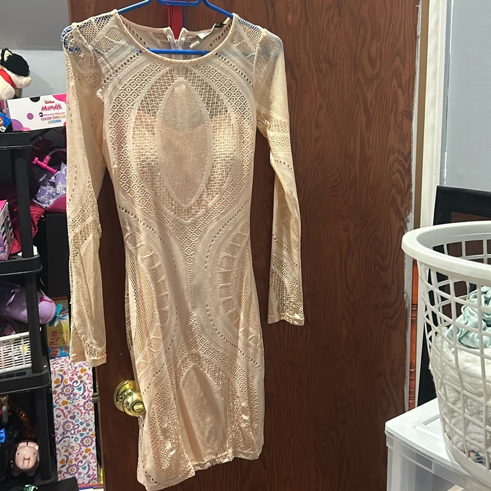 Knee length peach dress with built in padding